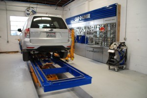 The Car-O-Liner Frame Racks at Robert’s Auto Repair -- BMW and Mercedes Benz Certified