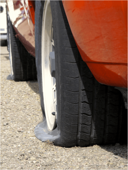 Flat Tire | Summer Travel Tips